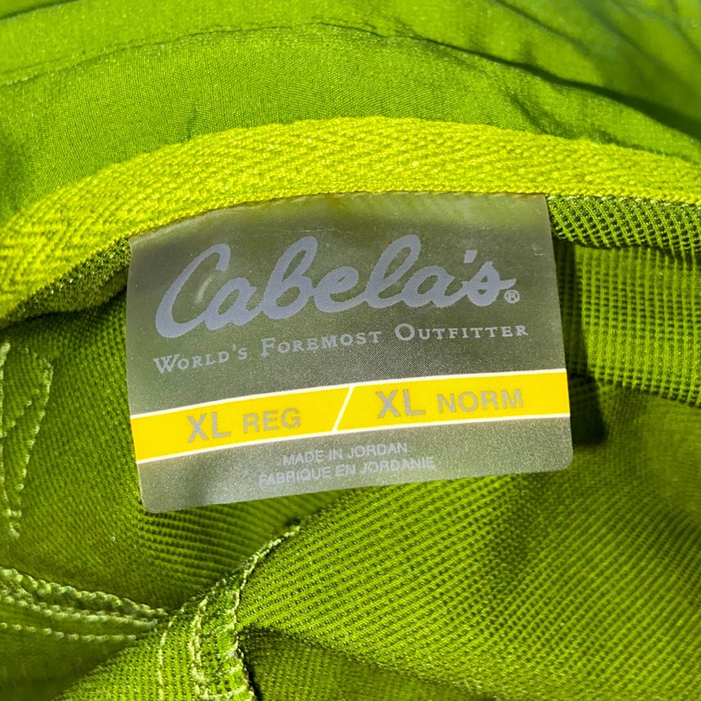 Green Cabela’s shirt,